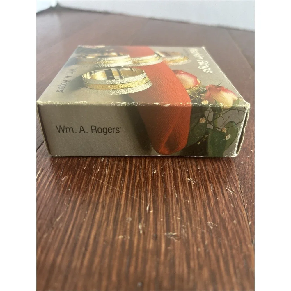 Wm. A. Rogers Napkin Rings Set of 4 Silver Plate with Brass New in Box 0117306